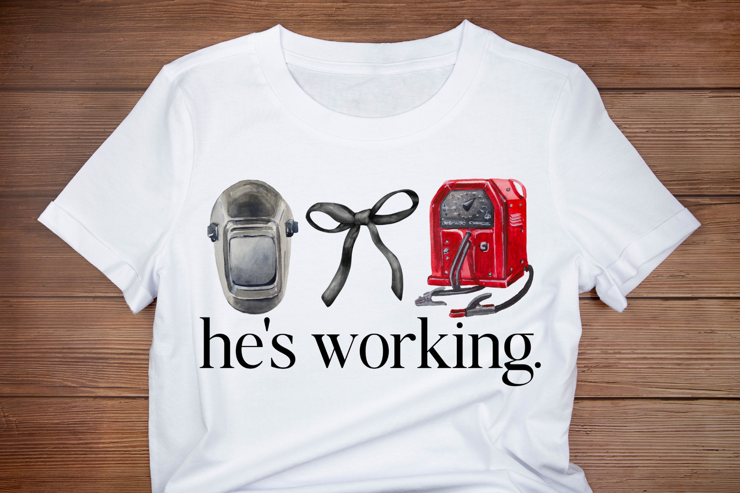 HE'S WORKING WELDER tee